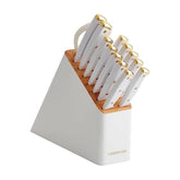 Farberware front view of white and gold knife block showing organized set and style benefit
