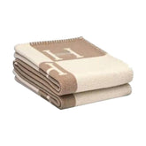 Fcteap front view of khaki throw blanket showing cozy styling and instant warmth