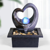 Ferrisland front view of tabletop fountain showing cascade and design benefit - calming centerpiece