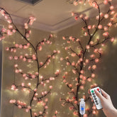 FIALAME front view of pink cherry blossom garland showing soft LEDs and branches for cozy ambience