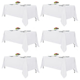 Fitable front packaging showing six white tablecloths and neat storage benefit