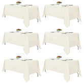Fitable pack packaging front view showing six ivory tablecloths and neat storage benefit