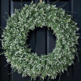 FOTEEWL front door wreath shown on entryway highlighting curb appeal