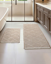 Furicher front view of brown and white two-piece rug set adds cozy decor