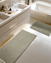 Furicher front view of green and white waffle bath mat set showing size and design, adds comfort