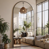 Furnbar arched full-length mirror front view showing elegant silhouette and room benefit