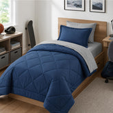 Furnishh twin comforter front view showing navy and grey reversible benefit