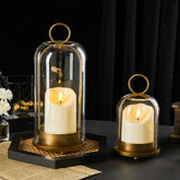 Ganwu front view of brass and glass hurricane set showing elegant silhouette and glow