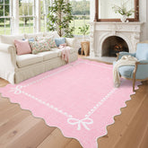 GarveeHome scalloped bow rug front view shows elegant pink and warm ambiance
