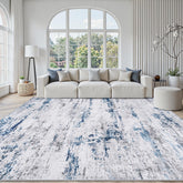 Gent drizz front view of 8x10 rug showing abstract white gray blue pattern and cozy benefit