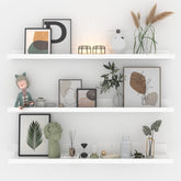 Giftgarden front view of white floating shelves showing sleek modern profile and tidy storage