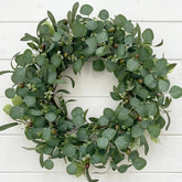 GinzeTop wreath on front door offering instant curb appeal