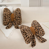 GKWW bow pillow front view showing cheetah pattern and cozy comfort