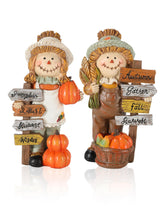 GoGnome front view of two scarecrow figurines showing friendly faces and plaques for warm seasonal display