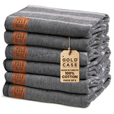 Gold CASE LYCIA front packaging showing set of six towels and modern black color benefit: clear presentation