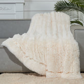 GONAAP ivory throw folded on shelf for soft decorative appeal