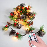 HamiFinee garland front view showing pine needles, cones, berries and warm lights for instant ambiance