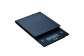 HARIO drip scale front view showing slim profile and clear platform, enabling stable brewing