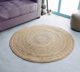 Hausattire front view of the round jute rug showing neutral tone and shape, enhances warmth