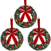 Hausse front door set of three wreaths showing coordinated festive entryway benefits