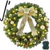 Hausse wreath on front door showing festive entrance and warm light