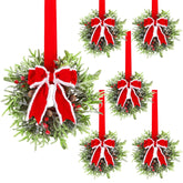 Hausse front view wreath on cabinet showcasing compact festive finish