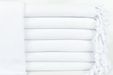 HAVLULAND folded towels in set of six showing compact packaging and portability