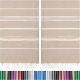 HAVLULAND front view of two beige towels showing full oversized dimensions and neat edges