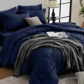 HEVUMYI front packaging showing complete navy bed-in-a-bag, easy setup benefit