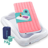 Hiccapop pink travel bed front view showing secure four-sided bumpers and portable design