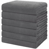 HOMEXCEL front packaging showing six grey towels and pack benefits