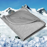 HOMFINE front view of packaged grey throw, ready for gifting and travel