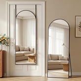 Homsion arched full-length mirror front view showcasing modern black frame and full reflection