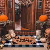 Homydecor coco coir welcome mat front view showing spooky design and durable scraping