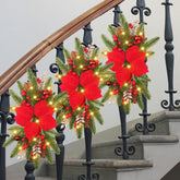 Hotop front view of three red berry swags showing festive arrangement and convenience
