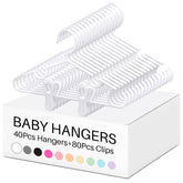Hsei front view of white baby hanger showing compact shape and benefit of space saving