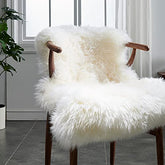 HUAHOO front view of white sheepskin rug showing plush, inviting texture