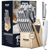 Huusk knife set front view in wooden block showing neat organization and accessibility