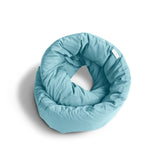 Huzi Infinity Pillow front view showing shape and airy blue color for travel comfort