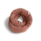Huzi Infinity Pillow front view showing terracotta color and wearable loop convenience