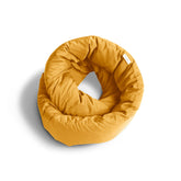 Huzi Infinity Pillow front view showing shape and ochre color, comfort visible