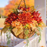 HyeFlora front view of hanging mums basket showing full orange blooms and basket benefit