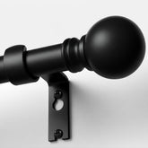 Immiehh front view black curtain rod showing elegant finish and balance