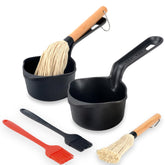 IPROUDER front view showing two cast iron sauce pots and brushes with packaging, ready to use