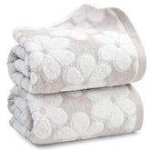 Jacquotha folded towels front view showing neat stack and inviting softness