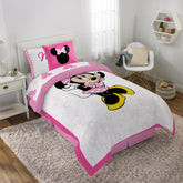Jay Franco Minnie Mouse comforter front view showing character design and bright white background, enhances room theme