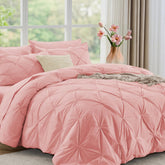 JOLLYVOGUE comforter front view showing elegant pink pintuck and neat drape