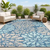 JONATHAN Y rug front view showing navy and aqua blooms, anchors outdoor seating