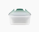 Joseph Joseph Nest Lock front view showing sage green set and space-saving design benefit