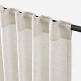 Jowels front view of two-panel linen curtains showing neutral color and full length benefit light diffusion